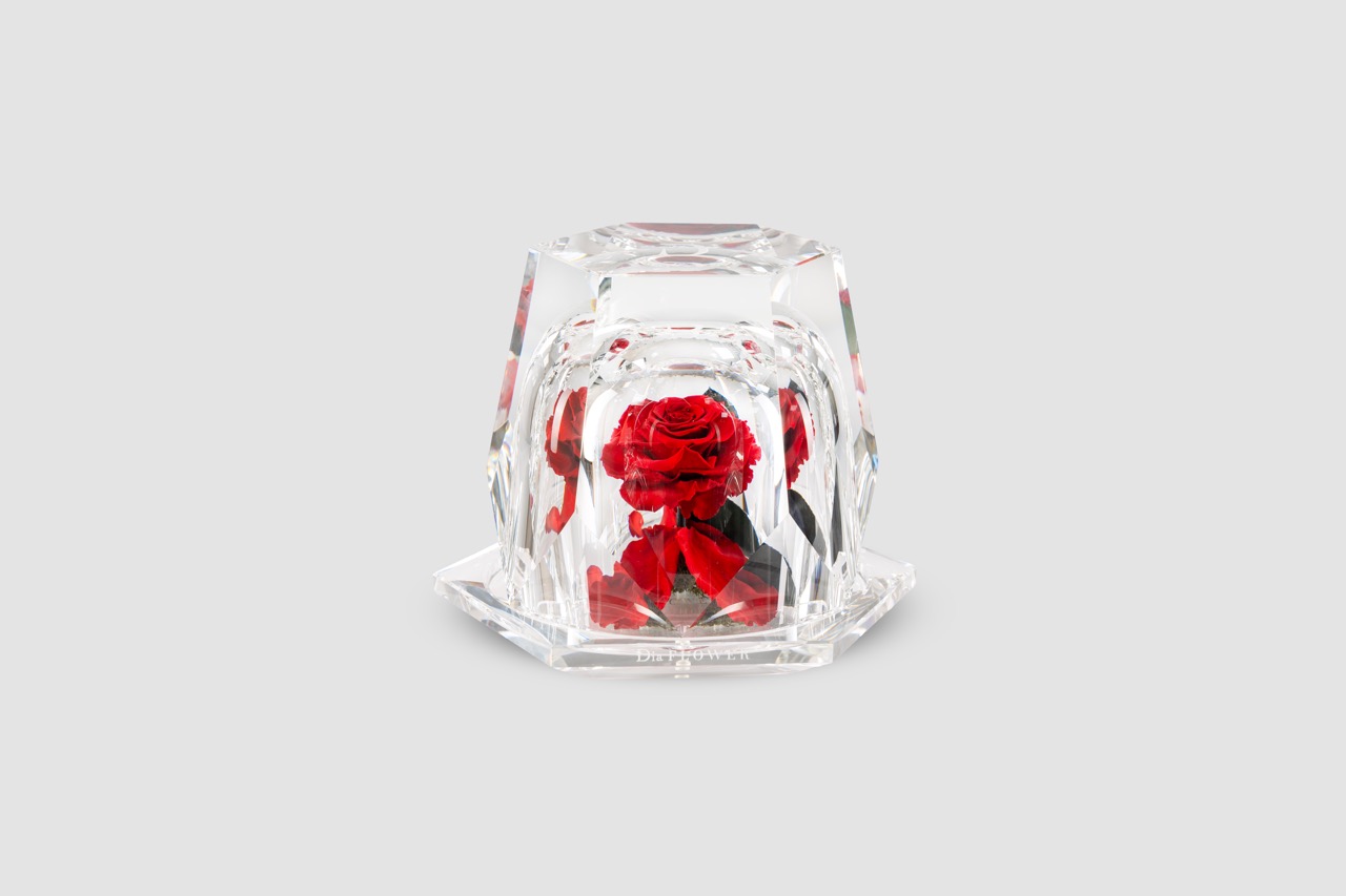 Eternal rose in a diamond-shaped crystal case