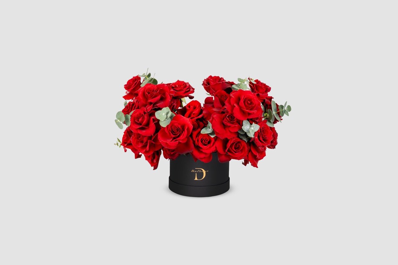 Small Velvet Valley floral arrangement in black box	