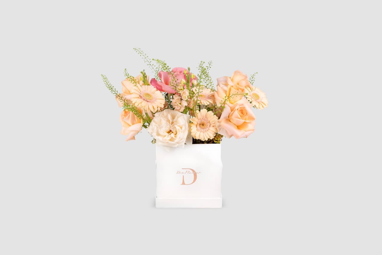 Elegant box arrangement of fresh flowers